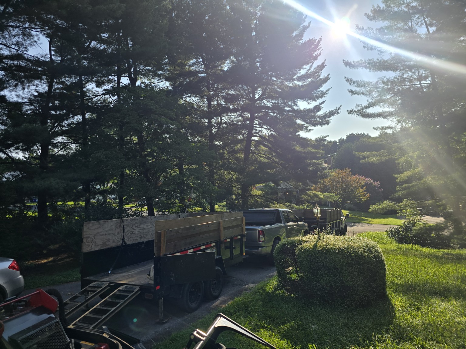 Truck and trailers on a tree job
